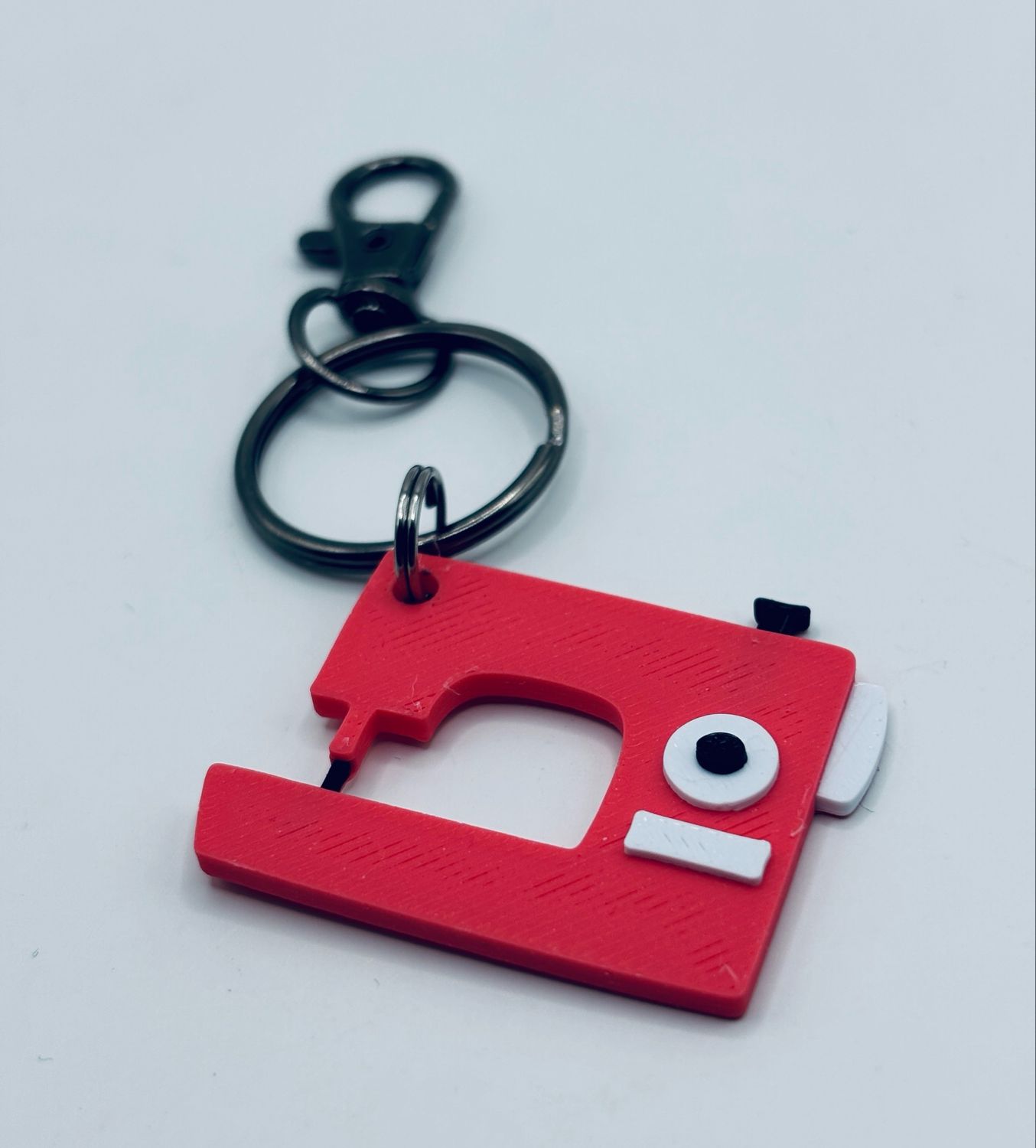 Sleutelhanger naaimachine roze