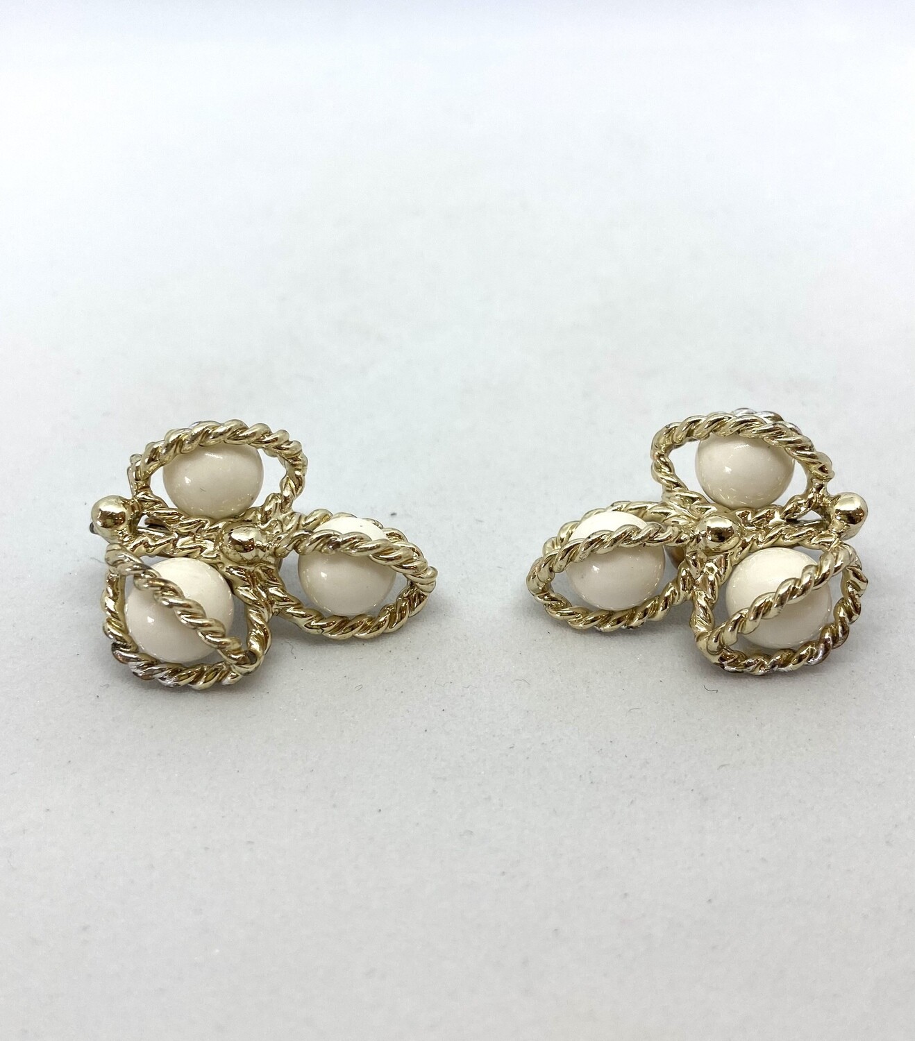 Gold Clip On Earrings With Three White Beads
