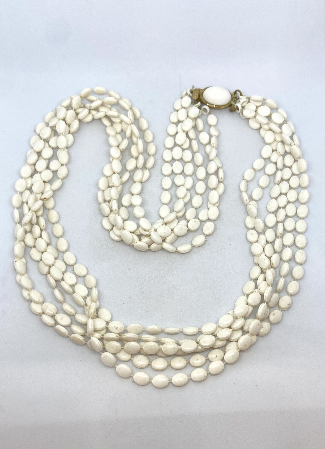 6 Strand White Bead Necklace With White Stone Clasp