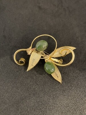 Gold Tone Brooch with Green Gemstones