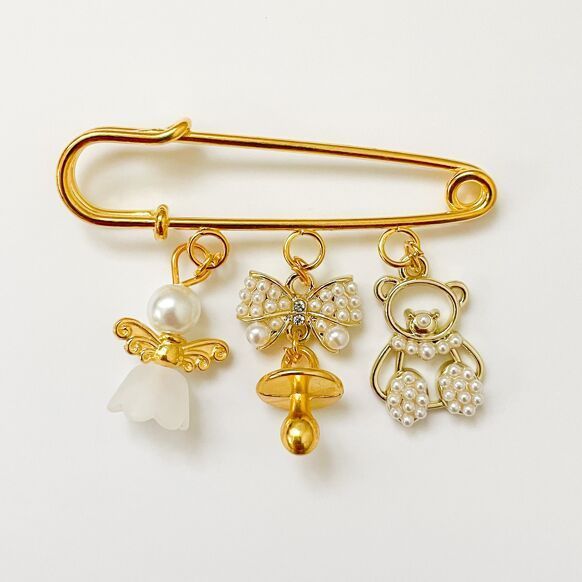Broches porte bonheur ( modèle au choix )