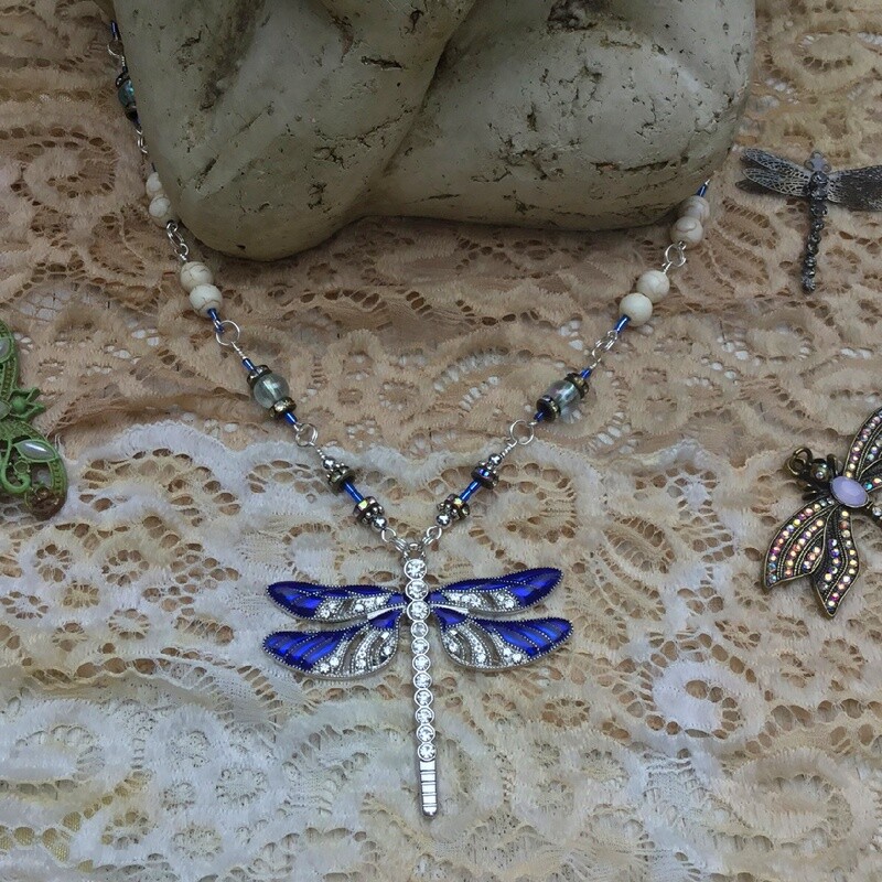 She Slays Dragons Wearing Blue Dragonfly Necklace