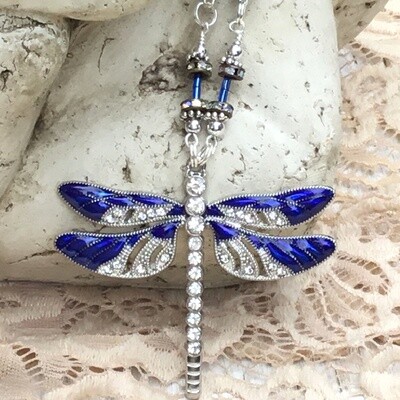 She Slays Dragons Wearing Blue Dragonfly Necklace