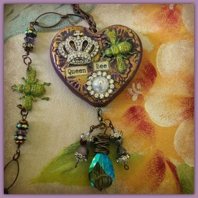 "Queen Bee" - Clay and metal mixed media heart, bee, crown and crystal/pearl flower necklace with "Queen Bee" sealed in heart.