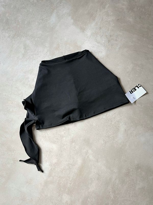 SHORT FALDA CON VOLADO