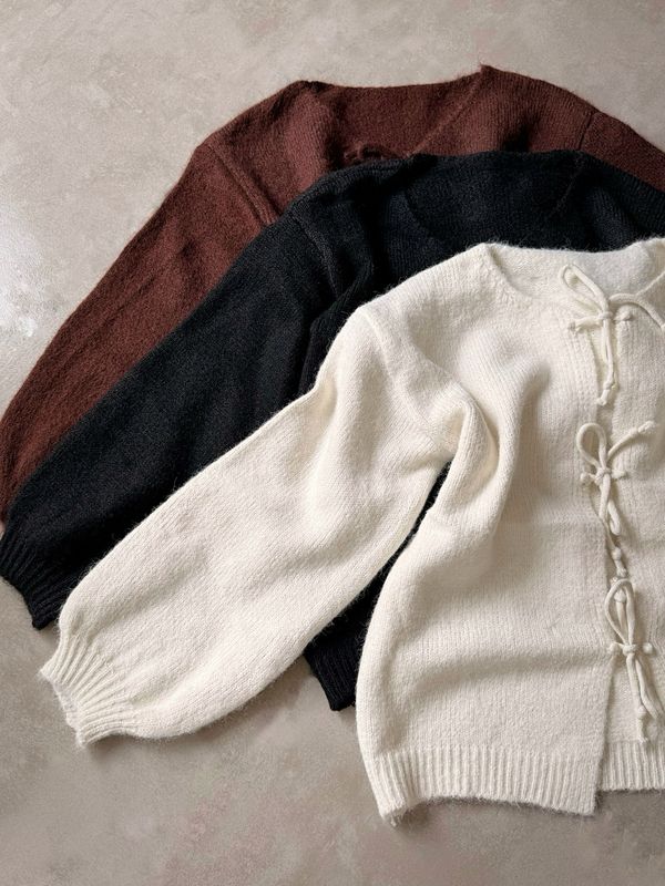 SWEATER DE MOÑAS