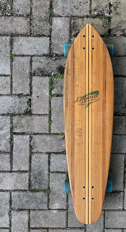 Solid hardwood Cruiser, 36 1/2" x 9 1/4", Mixed hardwoods Solid hardwood Cruiser, 36 1/2" x 9 1/4", Mixed hardwoods