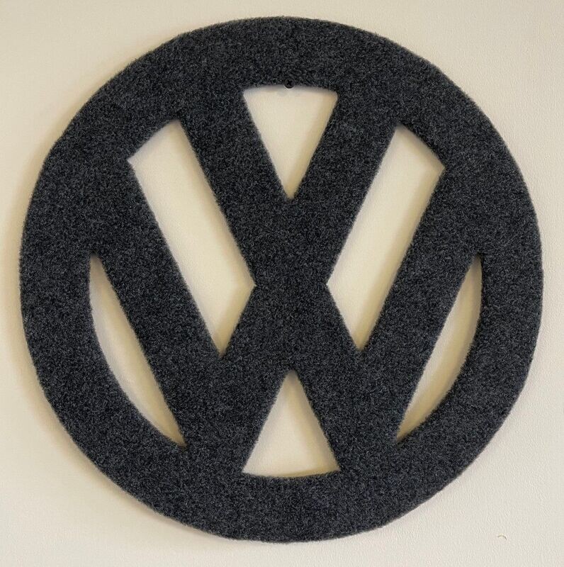 Wooden VW Logo with Carpet Covering