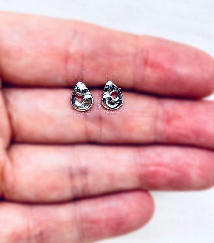 Små sølvbestikk studs