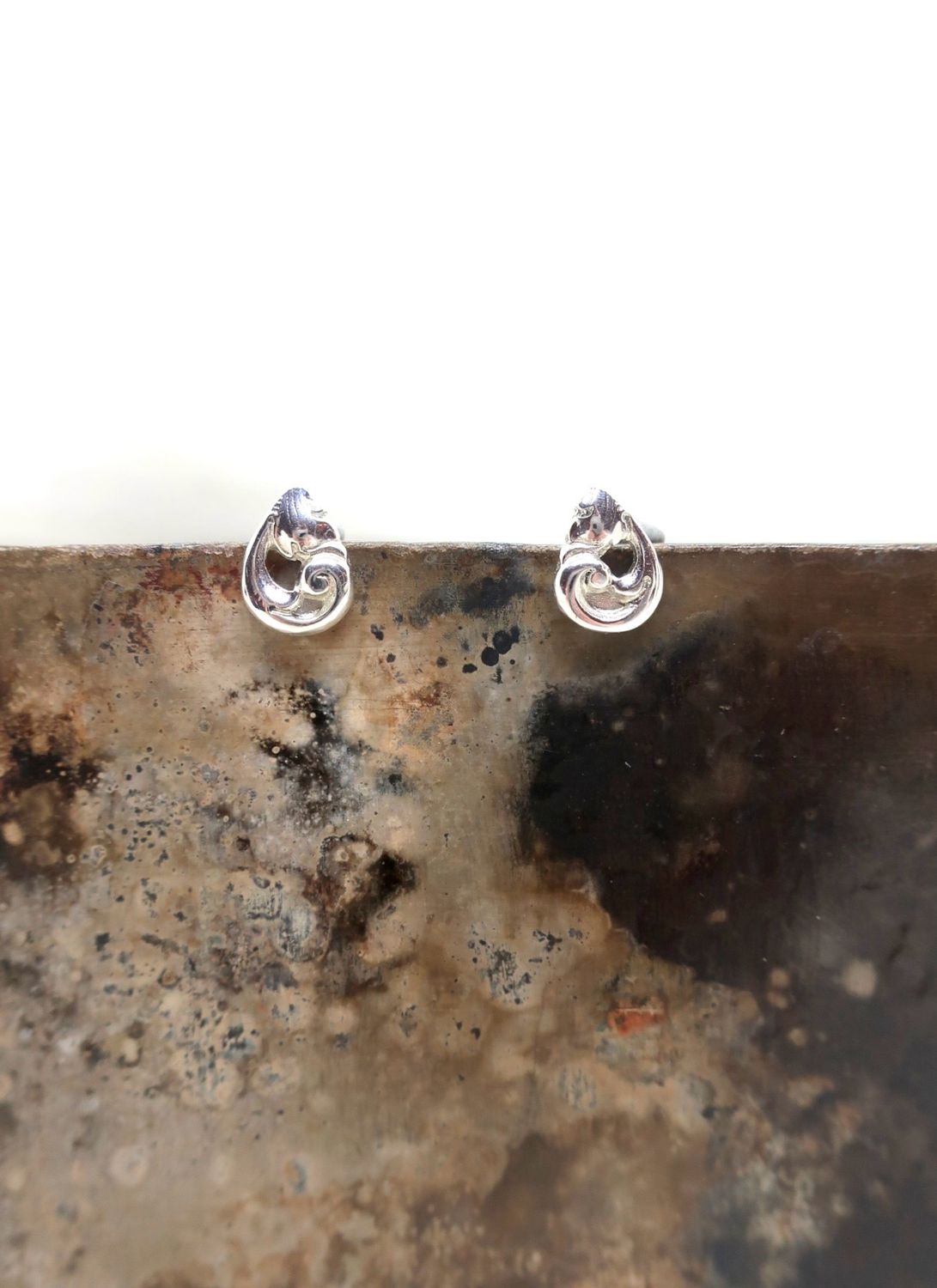 Små sølvbestikk studs