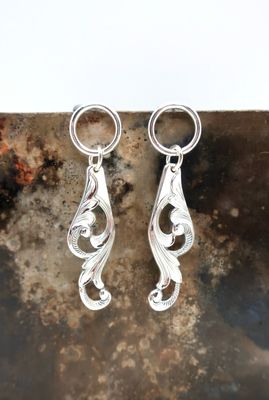 Ørepynt av sølvbestikk