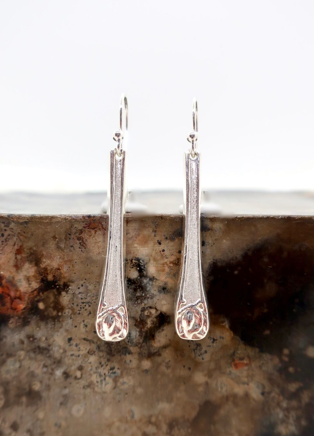 Ørepynt i Opphøiet rose