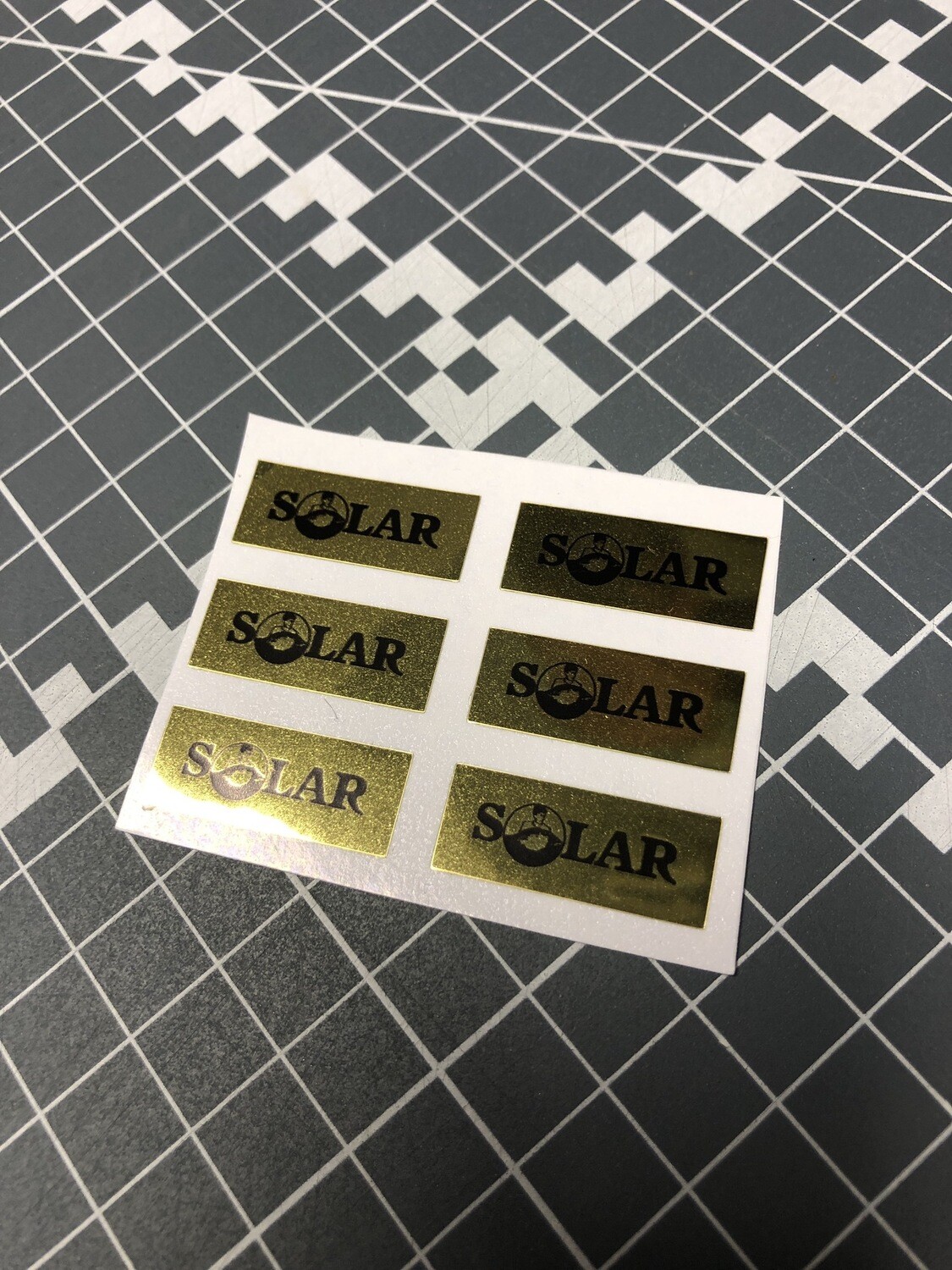 Solar Logo On Gold Mirror Chrome Rectangles