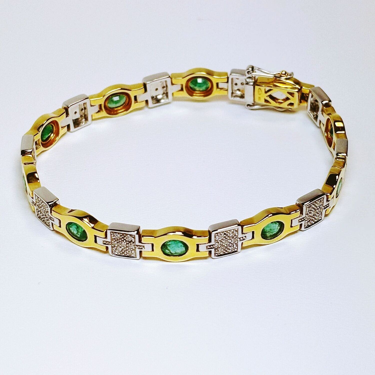 Bracelet or jaune et pierres précieuses