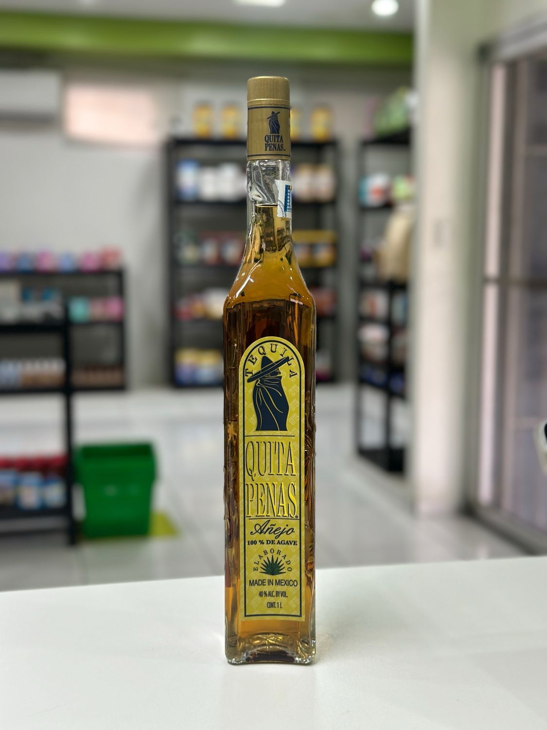 Quita Penas Tequila Añejo Elaborado en Mexio 40% Alc Vol