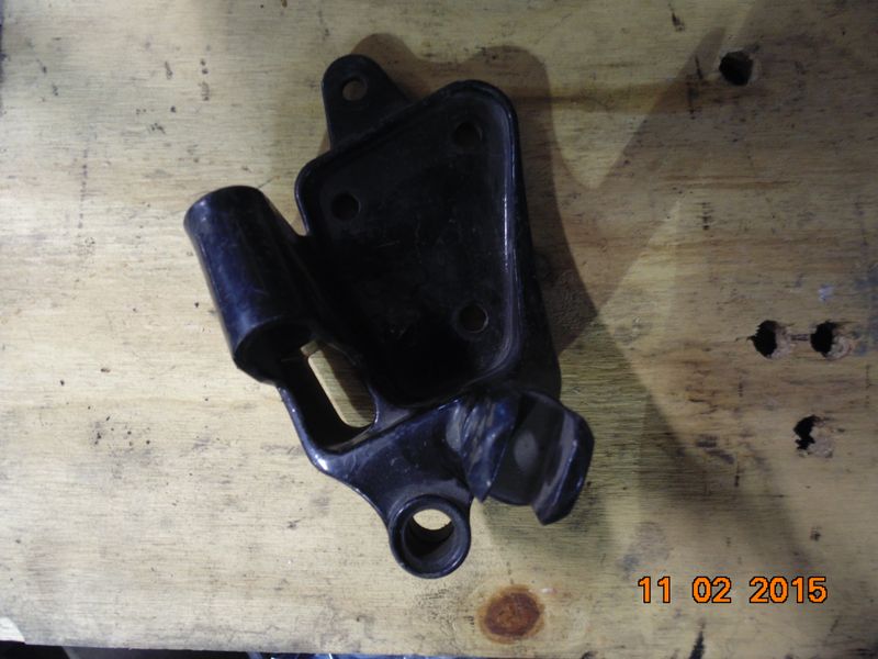 JIFFY STAND,SHIFT LEVER AND FOOTREST BRACKET SOFTAIL