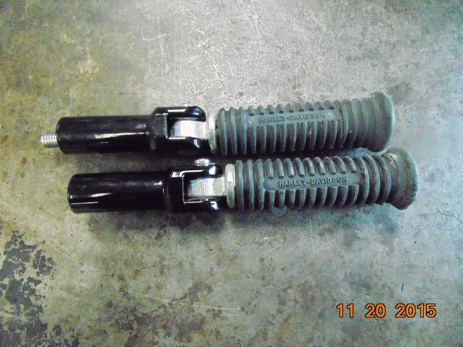 Harley Softail FLSTC Heritage OEM Passenger Foot Pegs