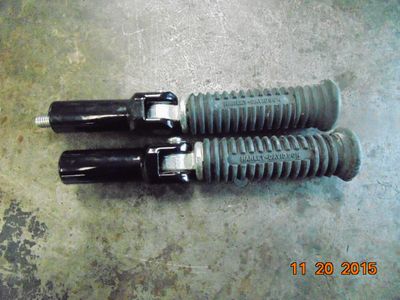 Harley Softail FLSTC Heritage OEM Passenger Foot Pegs