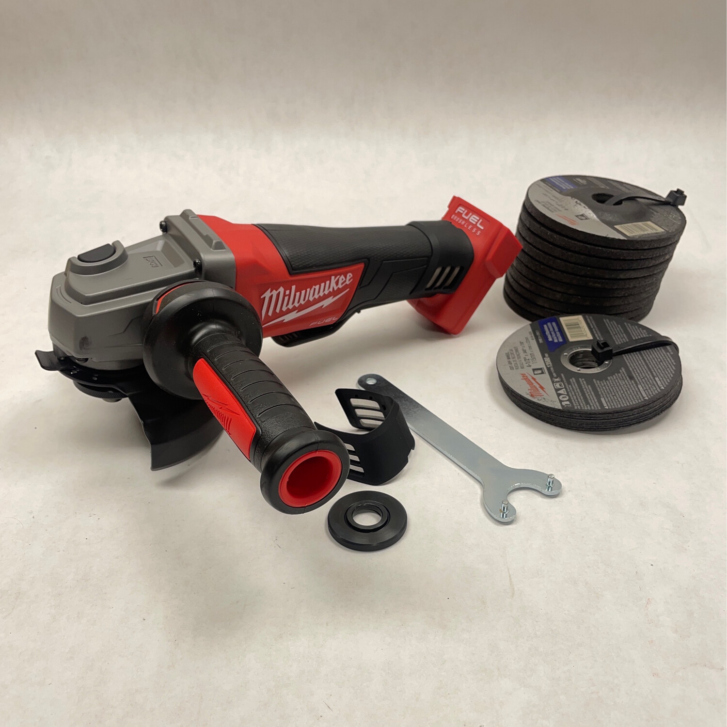 New Milwaukee M18 FUEL 4 1/2”-5” Angle Grinder + Wheels