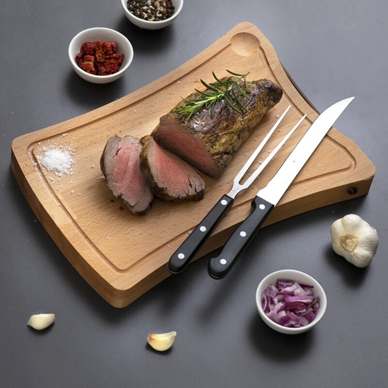 Beech-wood cutting board with knife and fork