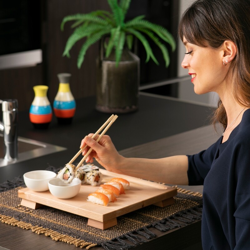 Beech-wood sushi cutting board including 2 white bowls and 2 chopsticks