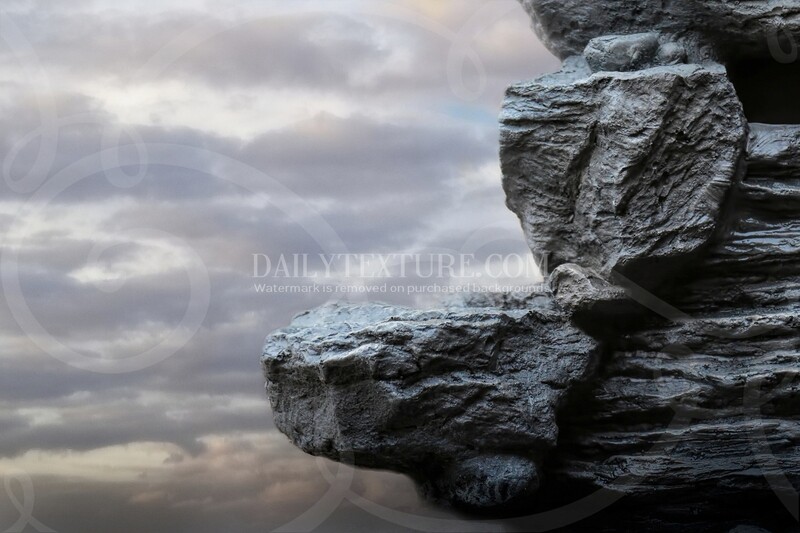 Rocky Ledge With Clouds Single Background