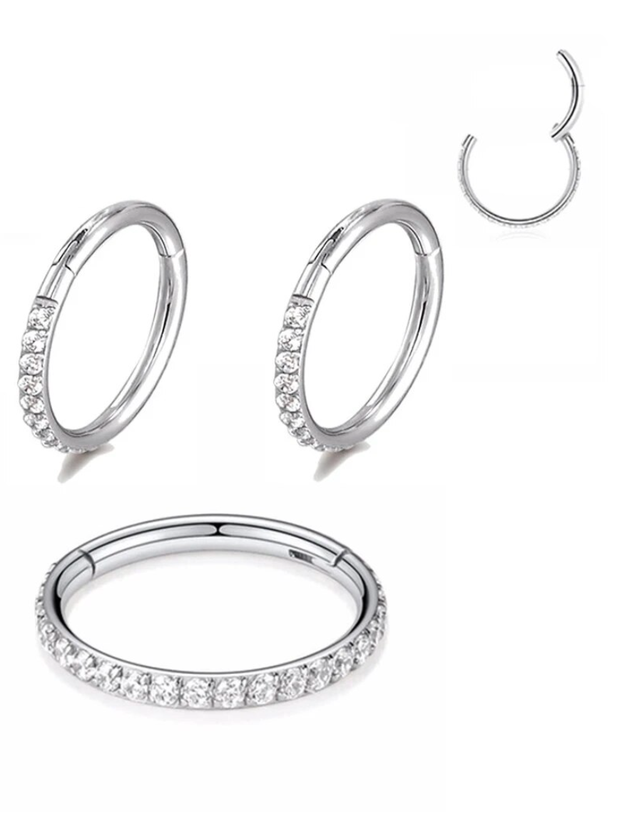 CLICKER TITANIO CON STRASS LATERALE