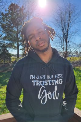 Out here trusting God hoodie