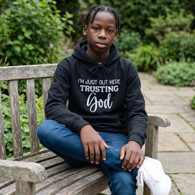 Out here trusting God hoodie
