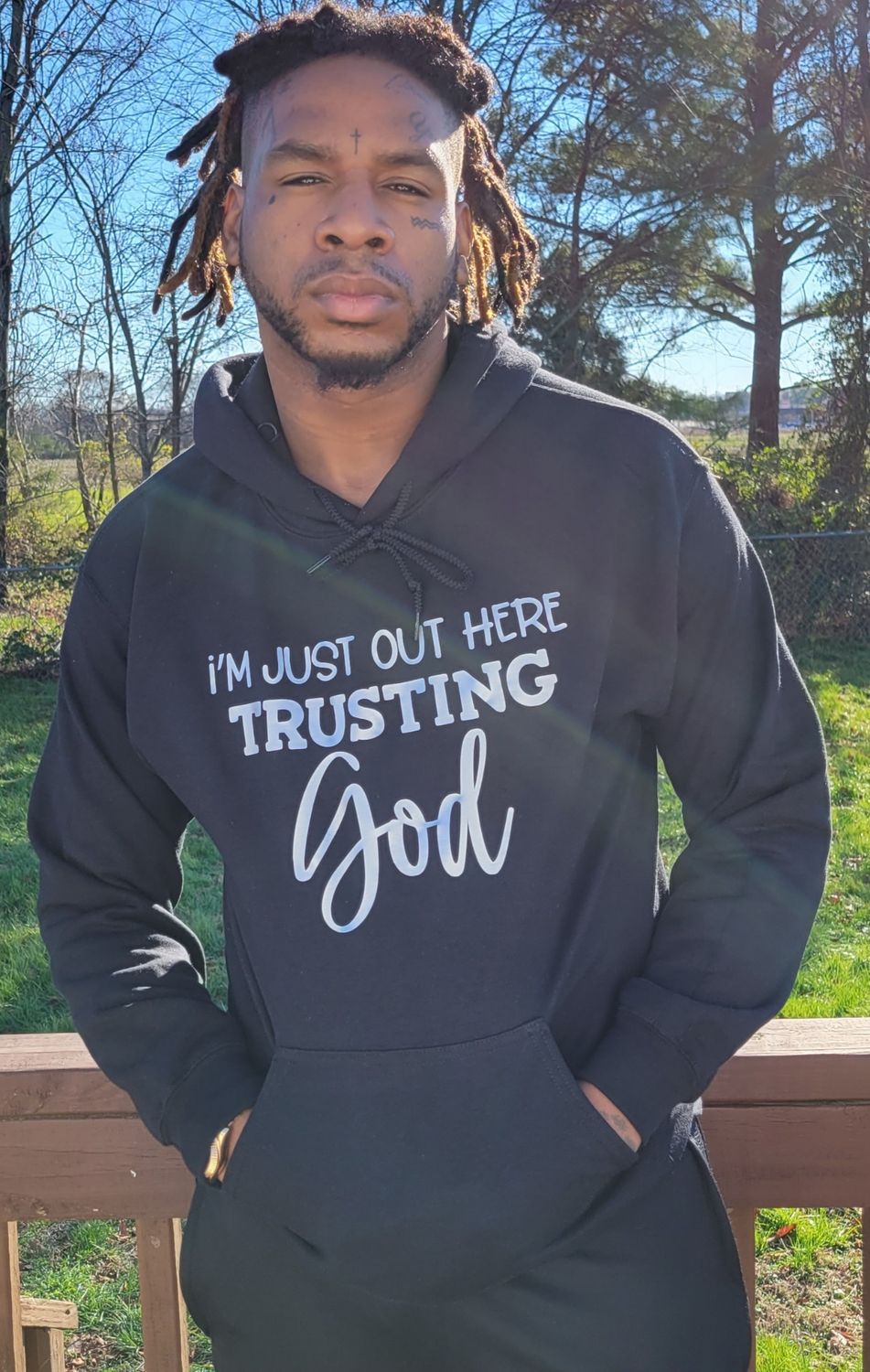 Out here trusting God hoodie