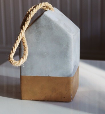 Cement House Decoration with Gold Detail Cement House Decoration with Gold Detail
