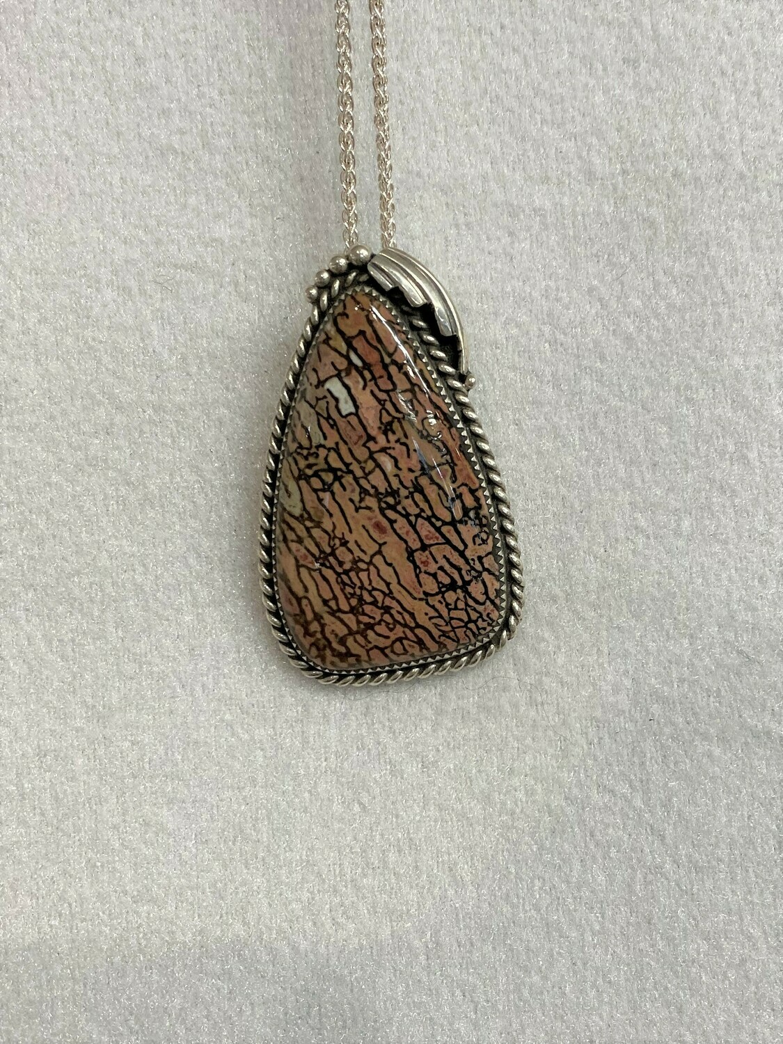 SOLD ! Amazing multi-color Dinosaur Bone Pendant