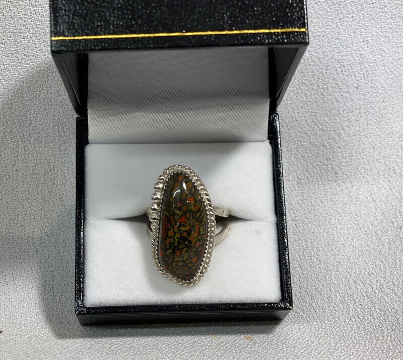 SOLD. Rare combination of Green and red gem dino bone
