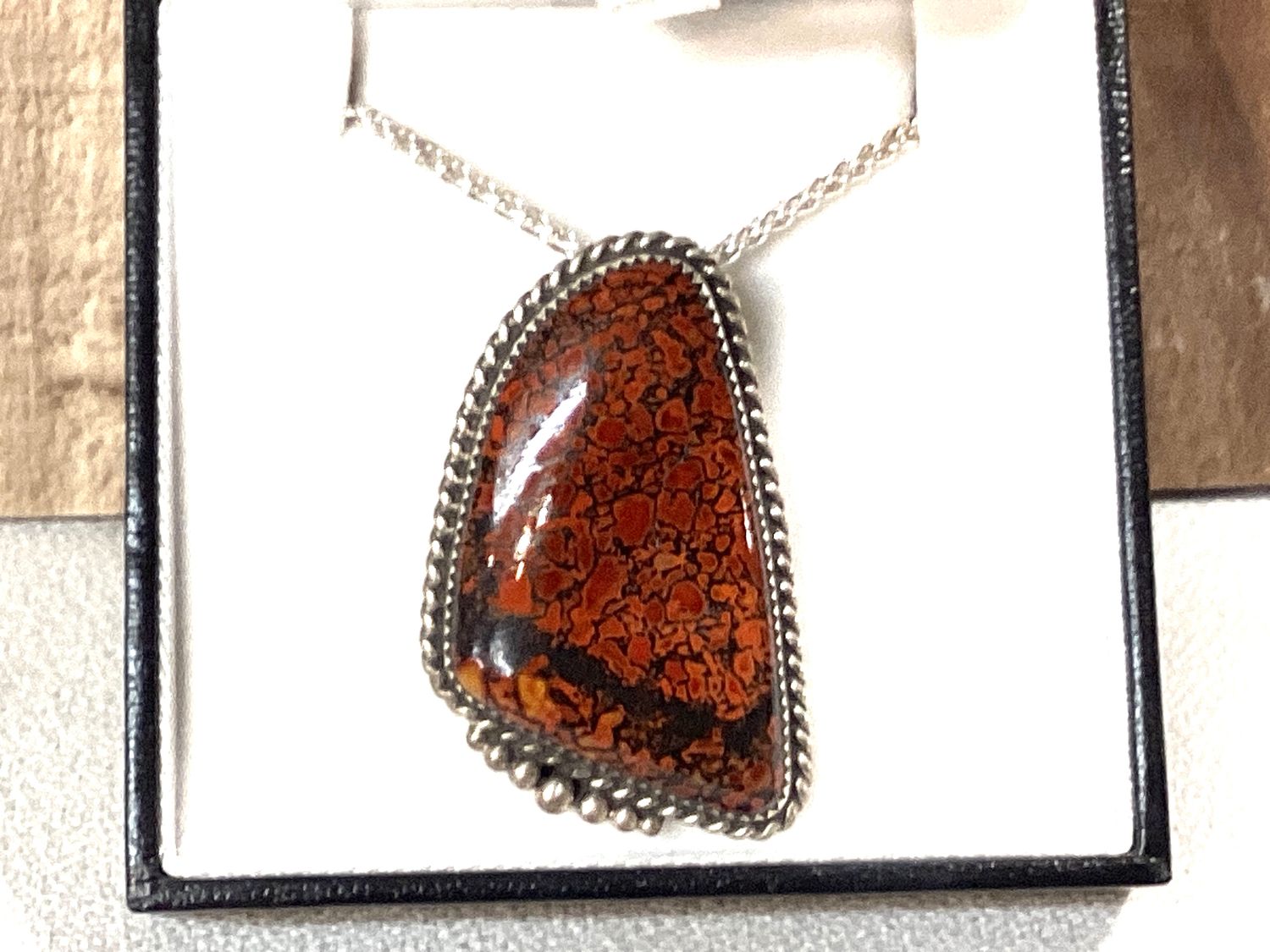 Beautiful red , orange and rust gem bone pendant