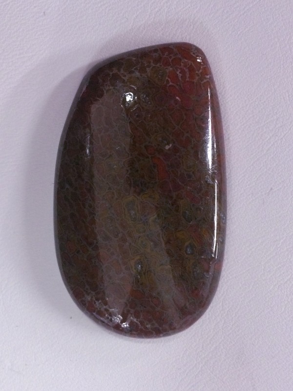 Red and tan gem bone cabochon