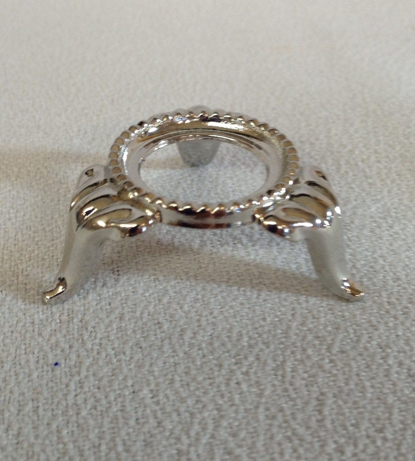 Display stand for spheres, marbles, collectibles/ small silver colored