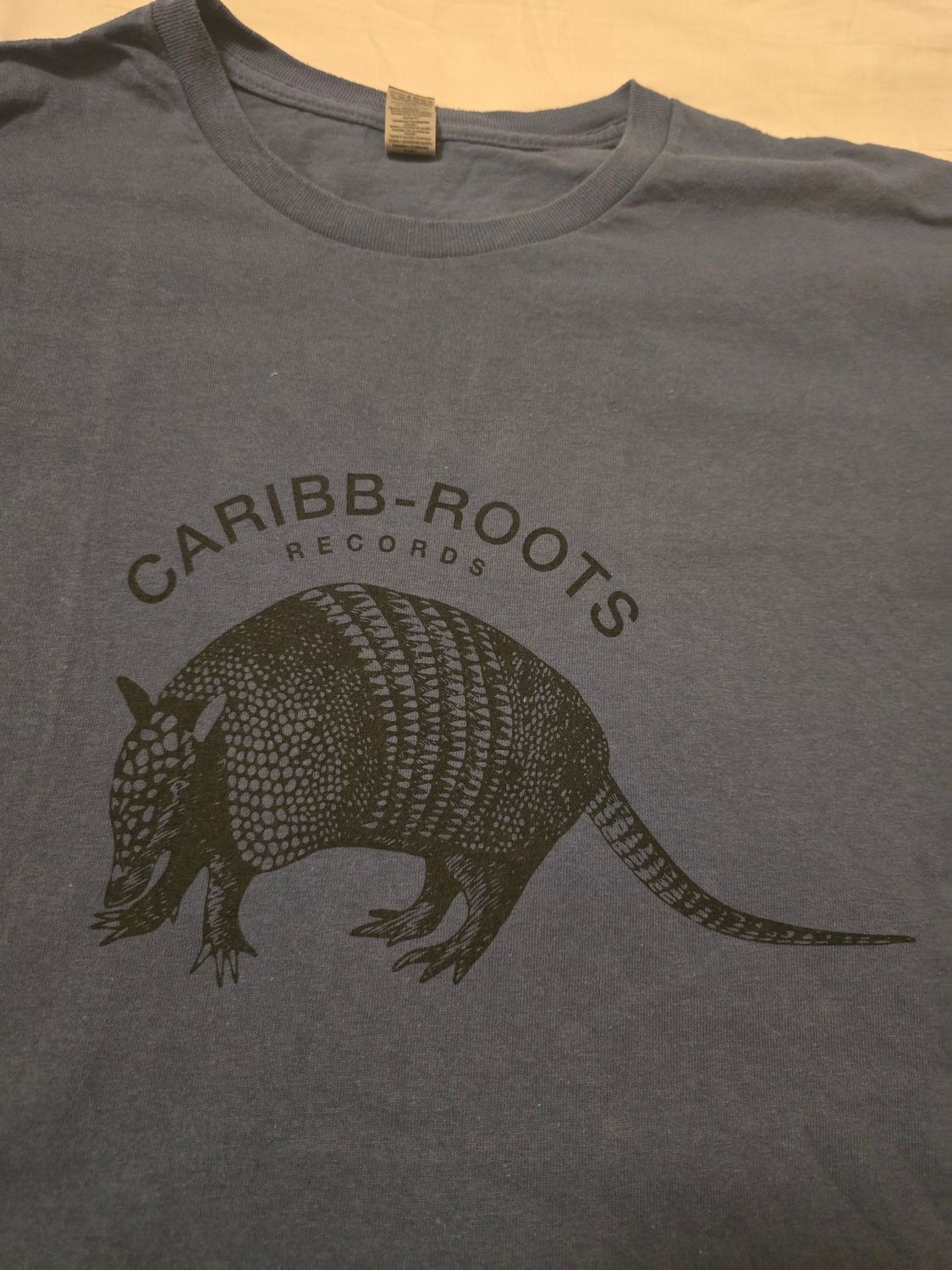 27 - TEE CARIBB ROOTS RECORDS