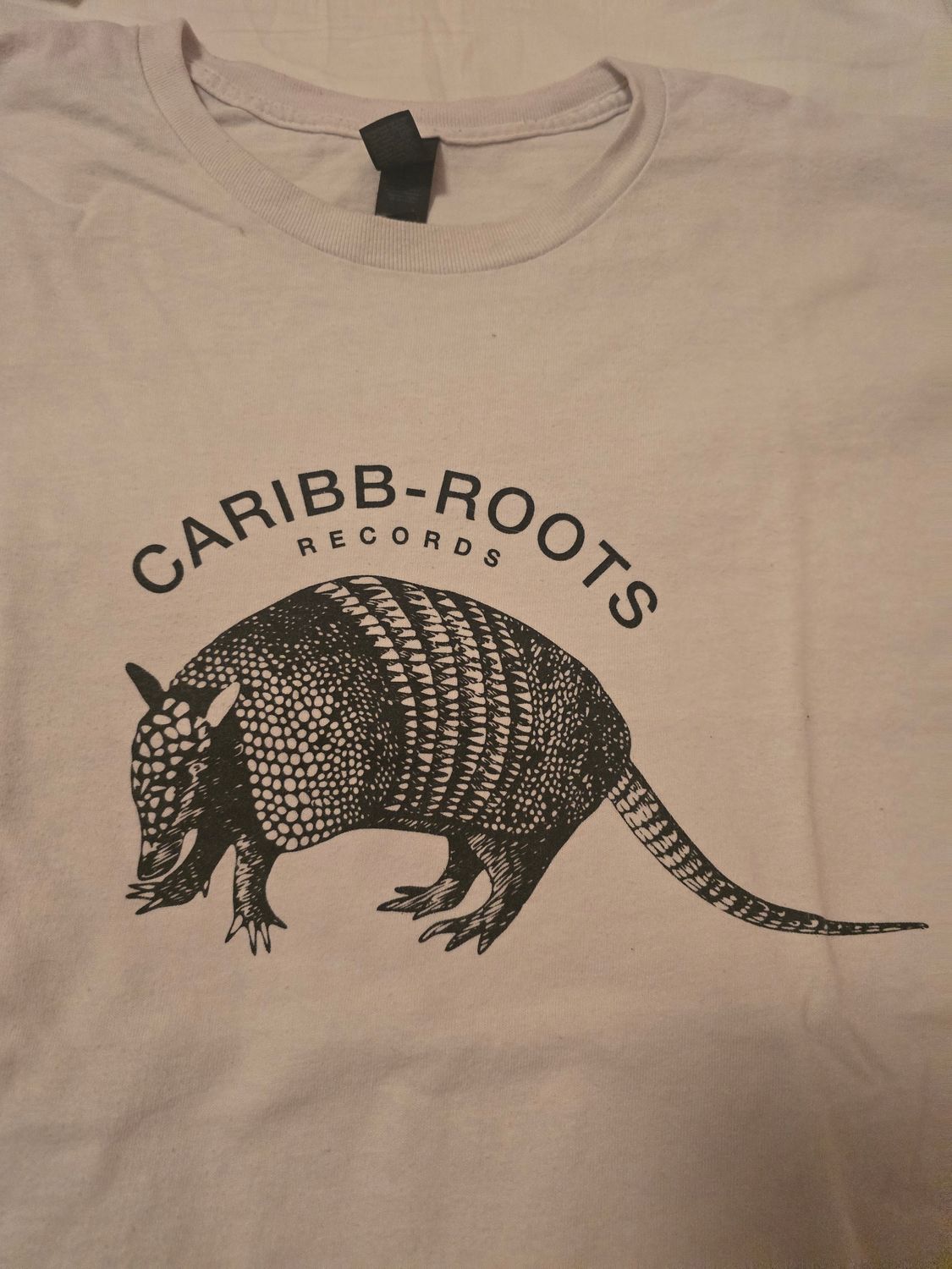 27 - TEE CARIBB ROOTS RECORDS