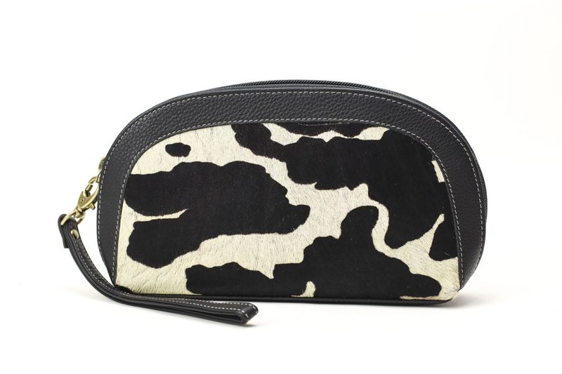 Bolso portatodo en piel con estampado de vaca