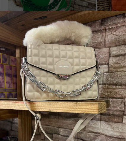 sac tres syle manche fausse fourrure