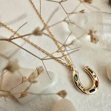 &quot;El Dorado&quot; Tiny Gemmed Horseshoe Charm Necklace in Gold