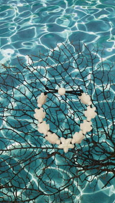 Bracciale tartarughe in ceramica colore bianco avorio. Bracciale tartarughe in ceramica colore bianco avorio.