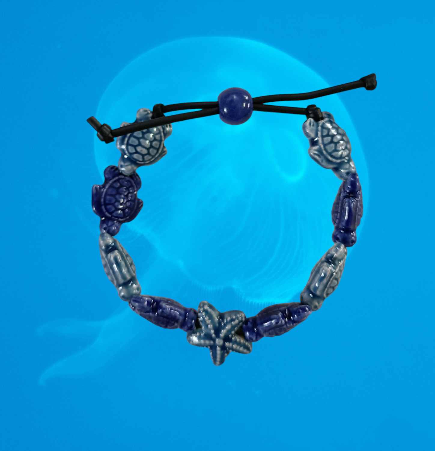 Bracciale tartarughe in ceramica colore blu carta da zucchero e blu scuro, stella blu carta da zucchero.
