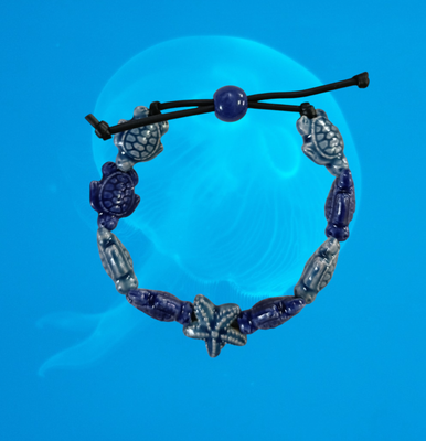 Bracciale tartarughe in ceramica colore blu carta da zucchero e blu scuro, stella blu carta da zucchero.