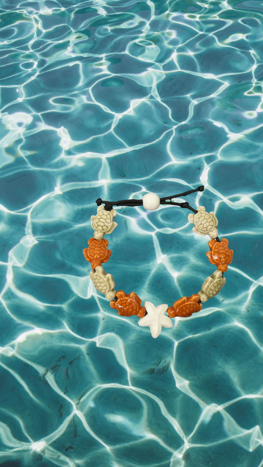 Bracciale tartarughe in ceramica colore beige e miele, stella bianca.