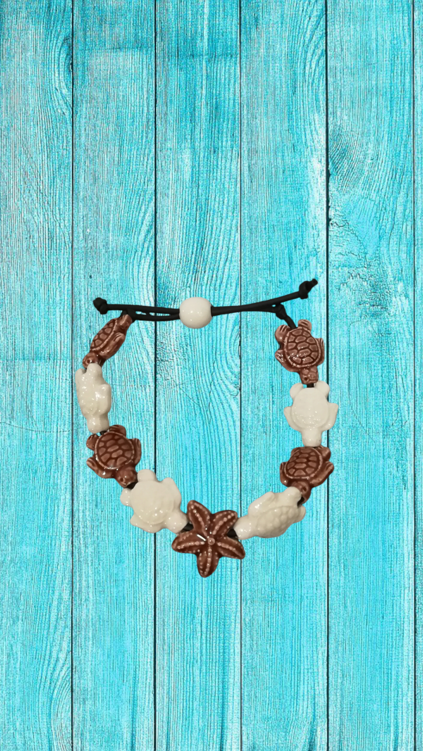 Bracciale tartarughe in ceramica colore marrone e bianco avorio, stella marrone.