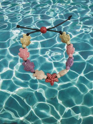 Bracciale tartarughe in ceramica colore beige,rosa chiaro,lilla,bianco avorio stella bordeaux.