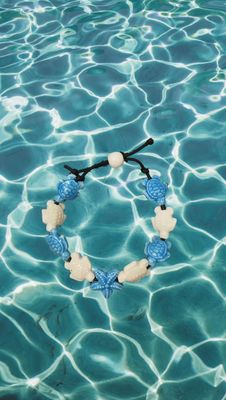 Bracciale tartarughe in ceramica colore turchese e bianco stella turchese.