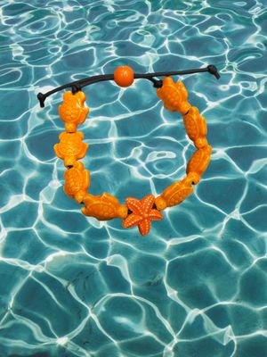 Bracciale tartarughe in ceramica colore arancione