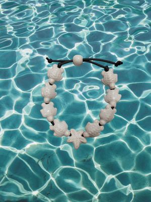 Bracciale tartarughe in ceramica colore bianco.